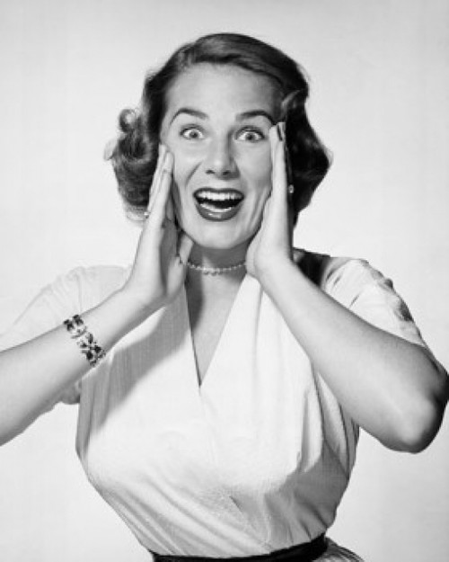 Portrait of a young woman looking surprised Poster Print - Item # VARSAL25510993