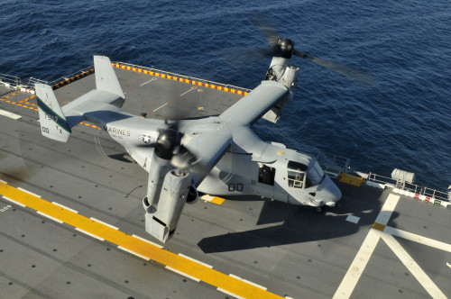Pacific Ocean, February 1, 2012 - An MV-22 Osprey lands aboard the amphibious assault ship USS Peleliu during flight deck qualifications Poster Print - Item # VARPSTSTK105218M