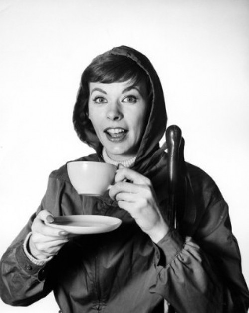 Portrait of a mid adult woman drinking from a tea cup Poster Print - Item # VARSAL25512618