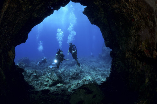 USA, Hawaii Islands, Divers At Entrance To Lava Tube; Lanai PosterPrint - Item # VARDPI1971005