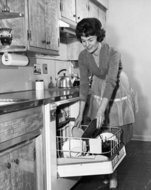 Young woman working in a kitchen Poster Print - Item # VARSAL25542083