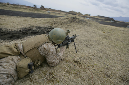 A U.S. Marine provides suppressive fire during a squad-assault training event Poster Print - Item # VARPSTSTK104423M