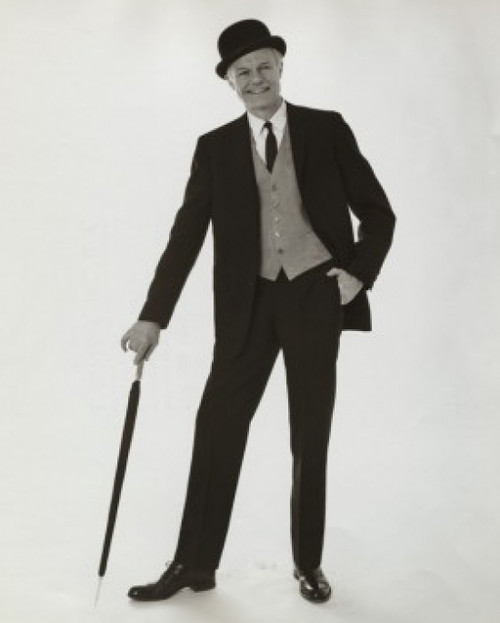 Portrait of a senior man smiling with an umbrella Poster Print - Item # VARSAL2553007