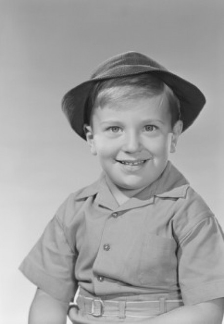 Studio portrait of boy in boy scout uniform Poster Print - Item # VARSAL255422880
