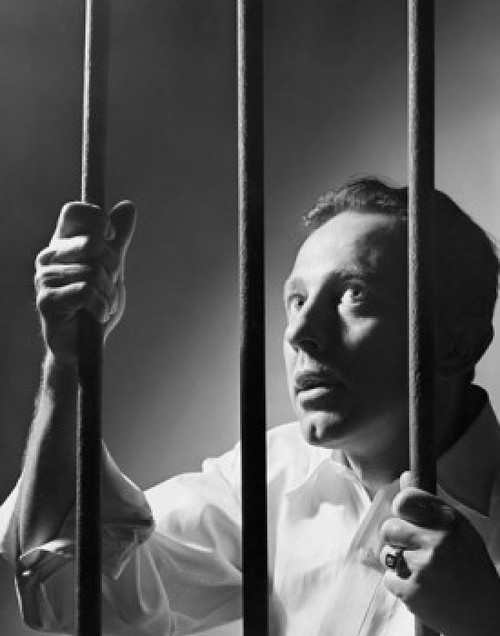 Close-up of a male prisoner holding prison bars Poster Print - Item # VARSAL2553793