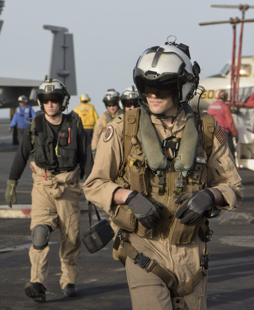 U.S. Navy pilots on the flight deck of the Nimitz-class aircraft carrier USS Theodore Roosevelt Poster Print - Item # VARPSTGCA100362M