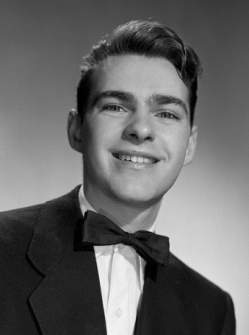 Young man smiling and wearing bow tie  portrait Poster Print - Item # VARSAL25517034B