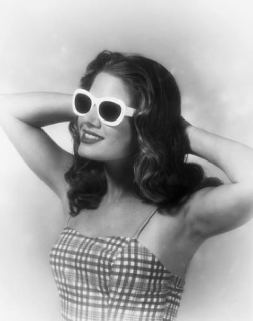 Close-up of a young woman smiling with her hands behind her head Poster Print - Item # VARSAL2941123