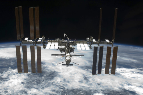 May 29, 2011 - The International Space Station backdropped by a blue and white Earth Poster Print - Item # VARPSTSTK204684S