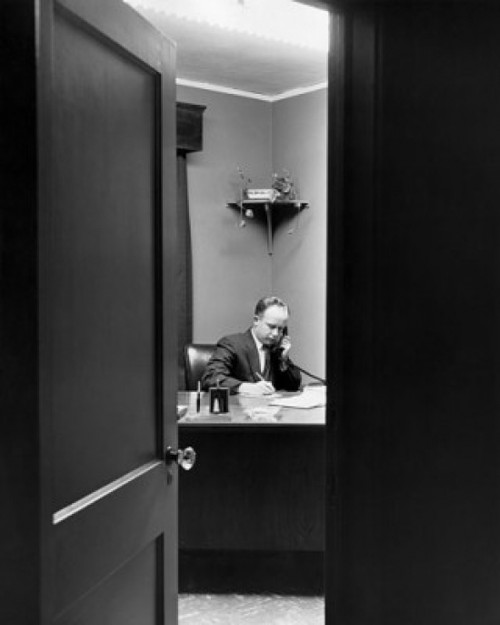 Businessman using a telephone in an office Poster Print - Item # VARSAL25527992 Businessman using a telephone in an office Poster Print - Item # VARSAL25527992
