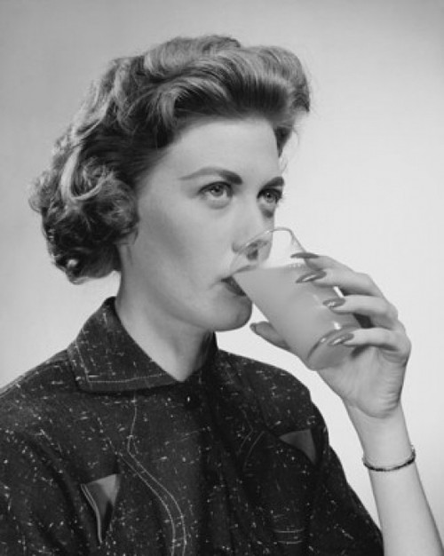 Close-up of a young woman drinking juice Poster Print - Item # VARSAL25512664C