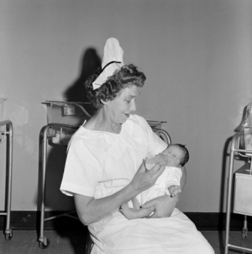 Nurse feeding newborn baby in hospital Poster Print - Item # VARSAL255422161