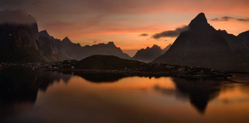 Reine village with dark mountains at sunset, Lofoten, Nordland, Norway Poster Print - Item # VARPPI169396