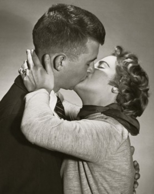 Side profile of a young couple kissing Poster Print - Item # VARSAL2552976