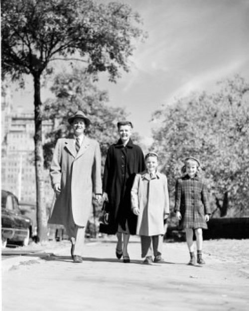Happy family with two children walking  front view Poster Print - Item # VARSAL255423270