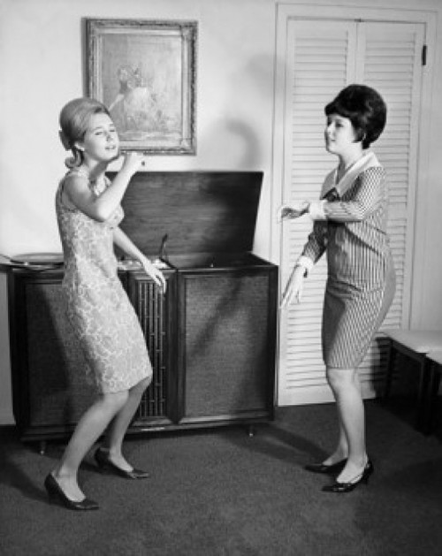 Side profile of two teenage girls dancing Poster Print - Item # VARSAL2554857