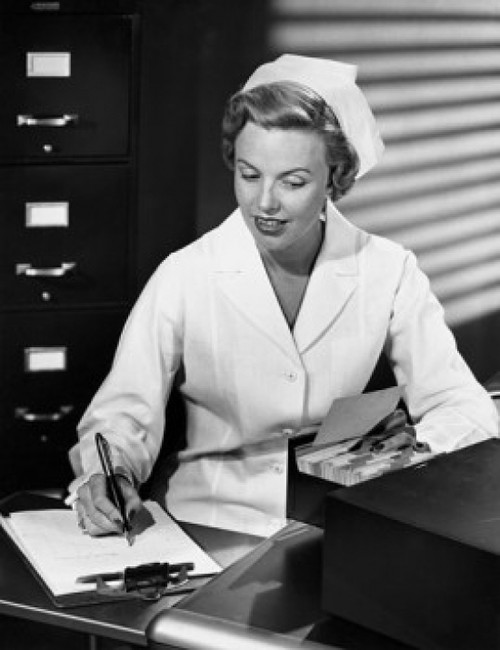 Female nurse writing with a pen on a clipboard Poster Print - Item # VARSAL2553537B