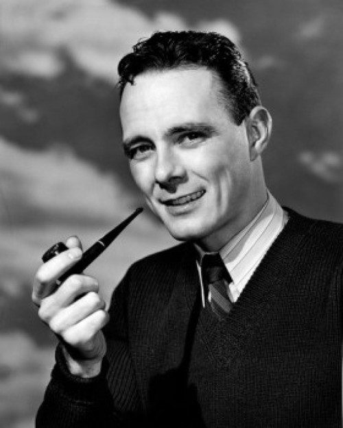 Studio portrait of man with tobacco pipe Poster Print - Item # VARSAL25523091