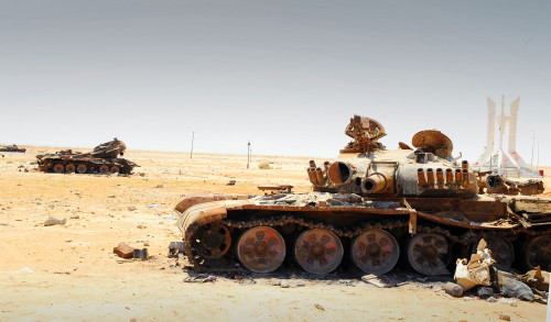 A T-80 tank destroyed by NATO forces in the desert north of Ajdabiya, Libya. A war betwean Gaddafi army and Libya's Transitional National Council army with air support from NATO started on March 17, 2011. Poster Print - Item # VARPSTACH100282M
