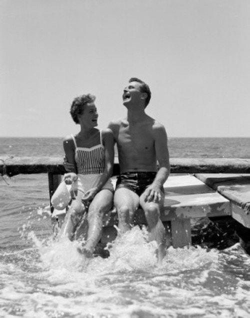 Young couple on pier at sea Poster Print - Item # VARSAL255416881A