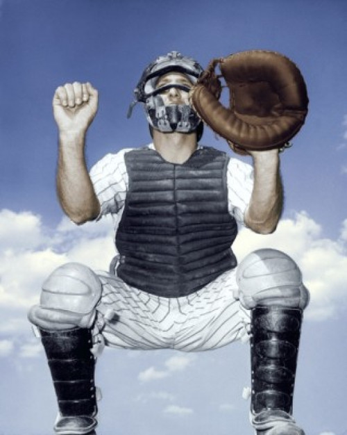 Close-up of a baseball catcher crouching Poster Print