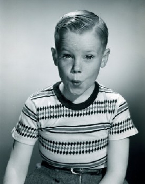 Portrait of boy pulling funny faces Poster Print - Item # VARSAL255417227