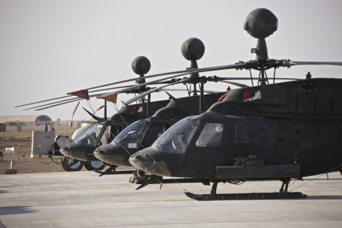 OH-58D Kiowa helicopters on the flight line at COB Speicher, Tikrit, Iraq, during Operation Iraqi Freedom Poster Print - Item # VARPSTTMO100732M
