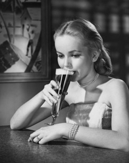 Close-up of a young woman drinking beer Poster Print - Item # VARSAL25512677B