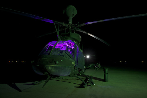 An OH-58D Kiowa helicopter at COB Speicher, Tikrit, Iraq, during Operation Iraqi Freedom Poster Print - Item # VARPSTTMO100809M
