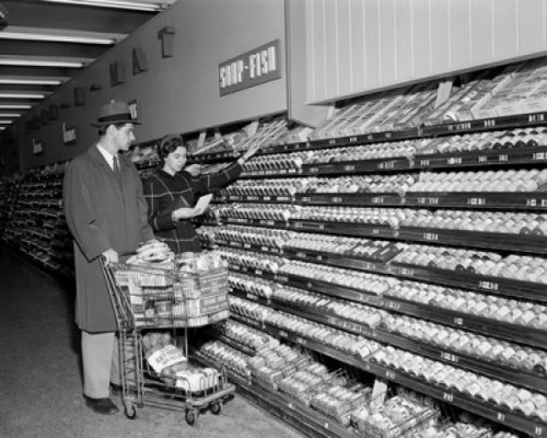 Young couple in supermarket Poster Print - Item # VARSAL255416840