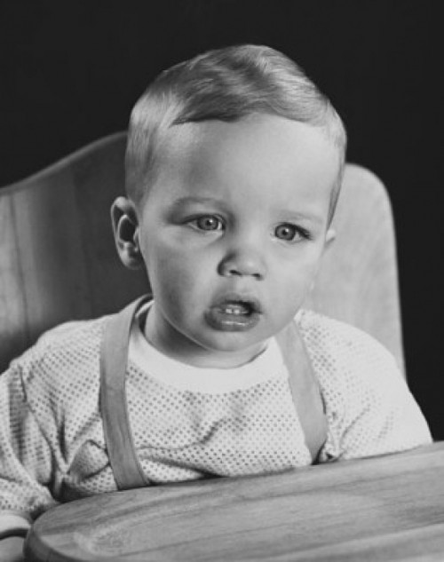 Close-up of a baby sitting in a high chair Poster Print - Item # VARSAL2559692A