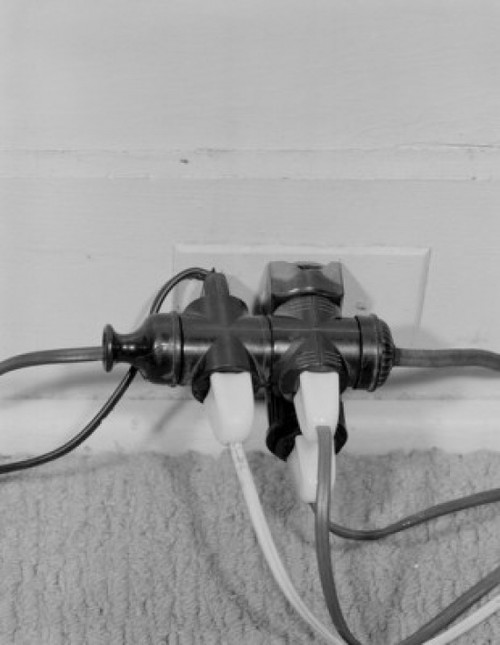 Overloaded electric outlet  close-up Poster Print - Item # VARSAL255418944