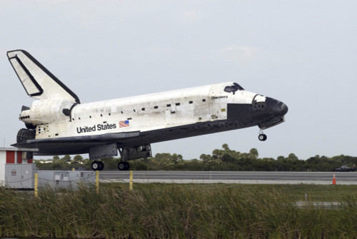 Space Shuttle Discovery touches down on the runway at Kennedy Space Center Poster Print - Item # VARPSTSTK202594S
