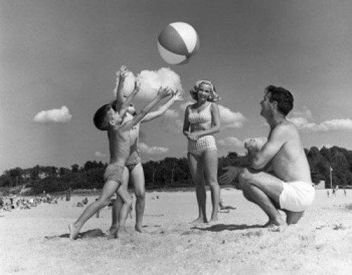 Parents with two children playing on beach Poster Print - Item # VARSAL2553168