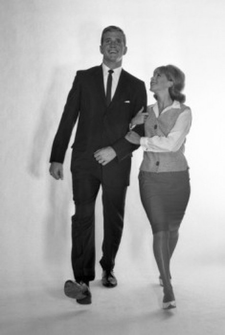 Mid adult couple marching Poster Print - Item # VARSAL255418020