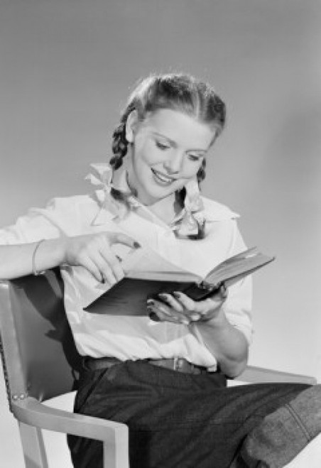 Teenage girl reading book. Poster Print - Item # VARSAL255422892