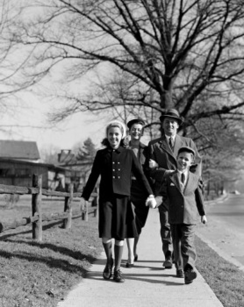 Parents with children on sidewalk Poster Print - Item # VARSAL255421843
