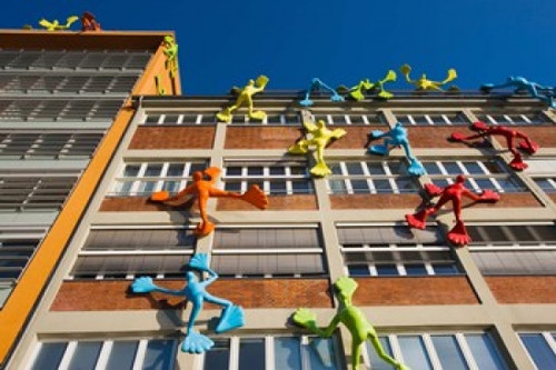 Flossies figures covering a building  Medienhafen  Dusseldorf  North Rhine Westphalia  Germany Poster Print by Panoramic Images (36 x 24) - Item # PPI138671