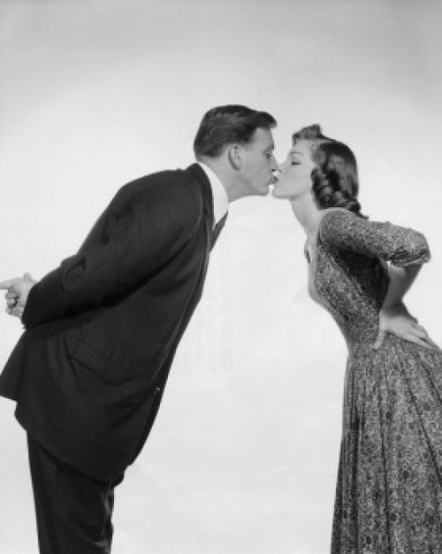 Side profile of a young couple kissing Poster Print - Item # VARSAL2555802