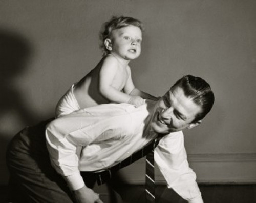 Side profile of a son riding on his father's back Poster Print - Item # VARSAL2559776