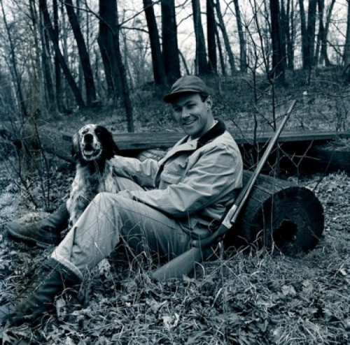 Portrait of smiling hunter with English Setter in forest Poster Print - Item # VARSAL255417211
