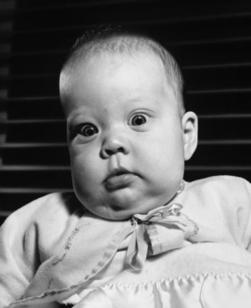 Portrait of a baby girl staring Poster Print - Item # VARSAL2559429B