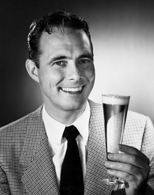 Portrait of a mid adult man holding a glass of beer Poster Print - Item # VARSAL2554213B