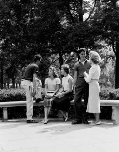 Group of students talking and flirting Poster Print - Item # VARSAL255419323