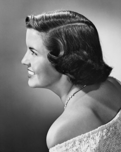 Side profile of a young woman smiling Poster Print - Item # VARSAL25510614