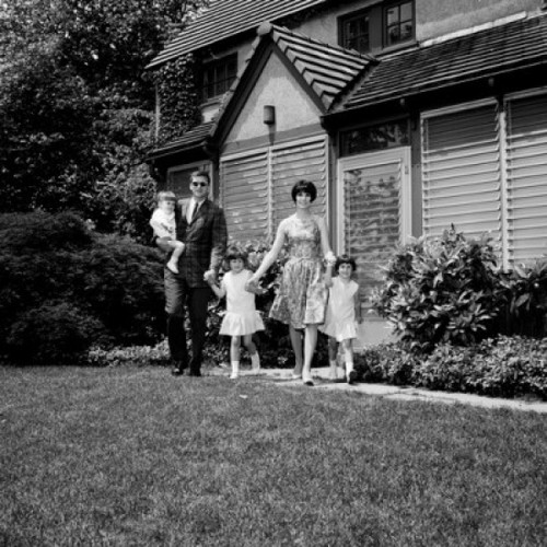 Portrait of parents with daughters in garden Poster Print - Item # VARSAL255417662