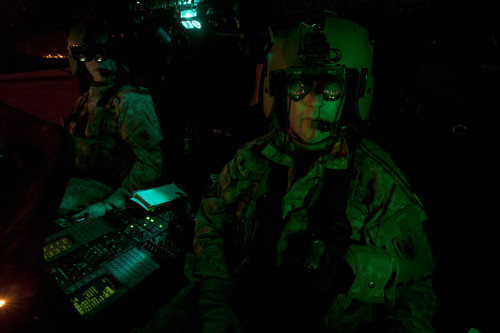 Pilots equipped with night vision goggles in the cockpit of a UH-60 Black Hawk helicopter at Davis Monthan Air Force Base, Arizona Poster Print - Item # VARPSTTMO100904M