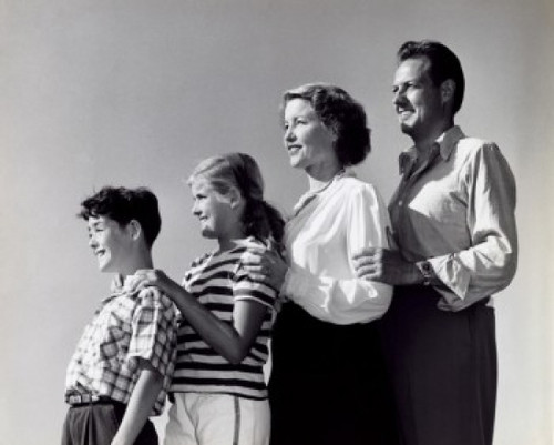 Side profile of parents and their children standing in a row Poster Print - Item # VARSAL25518630