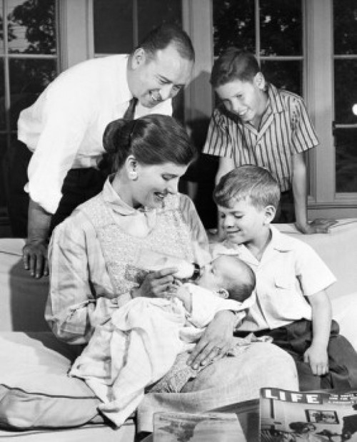 Family with boys in living room Poster Print - Item # VARSAL255417625