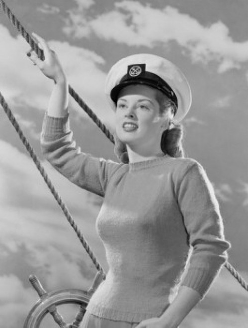 Female sailor holding rope at helm Poster Print - Item # VARSAL255422966